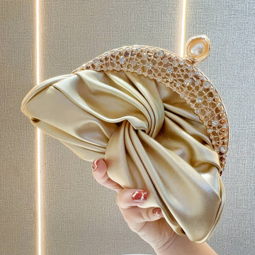 Elegant Golden Clutch Bag with Golden Rhinestone Crown
