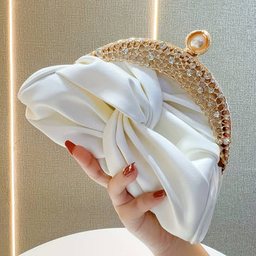 Elegant White Clutch Bag with Golden Rhinestone Crown